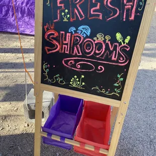 a sign for fresh mushrooms
