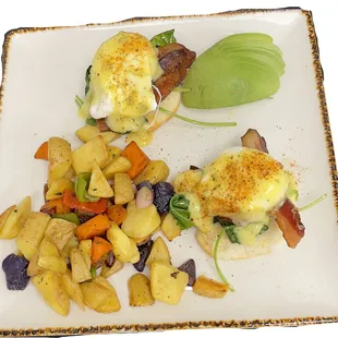 eggs benedict with potatoes and carrots