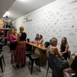 a group of people sitting around a table