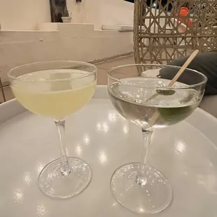 two cocktails on a table