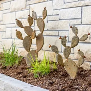 Outdoor art ideal for patio, poolside or landscape. Metal cactus, trees, succulents, and flowers are no-maintenance and weather-resistant.