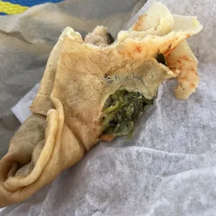 All the filling at the bottom. Super mushy with the raw dough. Not worth $12