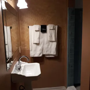 Bathroom in one of the units where we were able to keep the old tile in the shower.