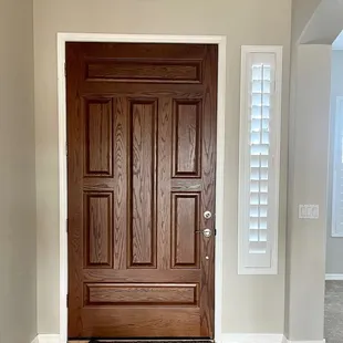 Front Door with Side Window with O'Hair Shutters from Desert Wind