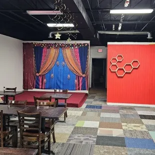 a room with tables and chairs