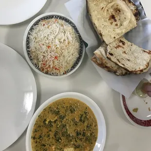 a bowl of rice and a bowl of bread