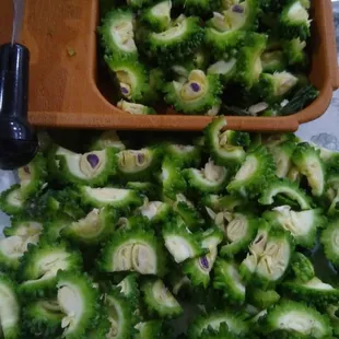 Never saw Karela/ kakarakaya like this when cut, notice the purple shade in the seeds, I doubt the sources a lot