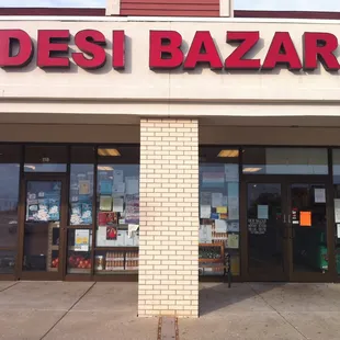 the entrance to a deli bazar