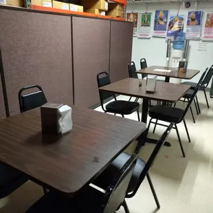 empty tables and chairs in a cafeteria