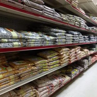 a shelf of bread and bread rolls