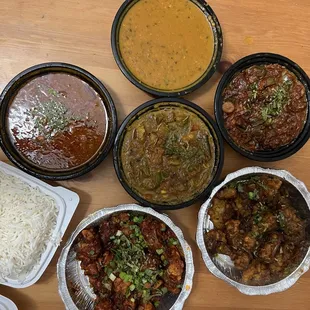a variety of dishes of food