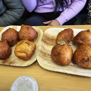 two plates of pastries on a table