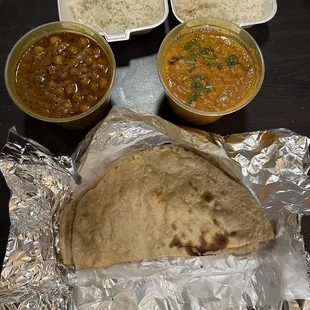 Chana Masala on the left and Malai Kofta on the right. Roti at the bottom.