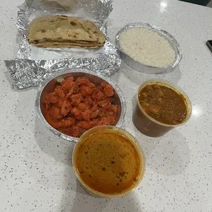 This is becoming a Friday tradition. Chicken 65, Chicken Vindaloo and Chicken Tikka Masala. Side of whole wheat naan. So good!