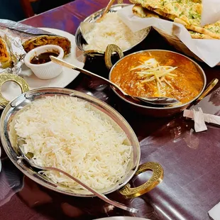 Chicken Tikka Roll, garlic naan, butter chicken, rice