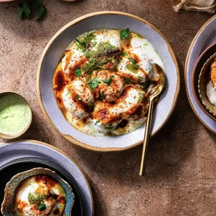 a bowl of eggs and other dishes