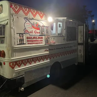 Food truck in the parking lot of Tumeric grocery store