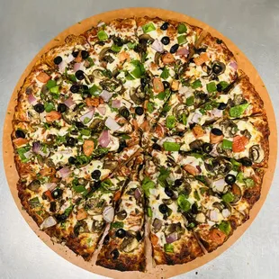 a pizza on a pizza board