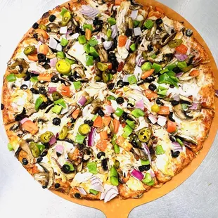 a pizza on a pizza board