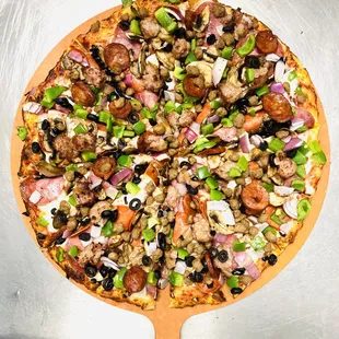 a pizza on a pizza board