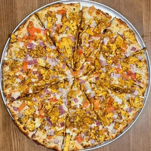 a sliced pizza on a pan