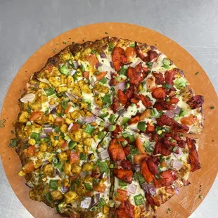 a pizza on a wooden board