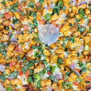 Butter chicken pizza !!! The aroma of this pizza hit my cravings it's so flavored and comes with a lot of chicken ! Enjoyed it very much :)