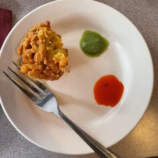 Onion Pakora, green and red chutney