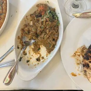 a plate of food and a glass of water