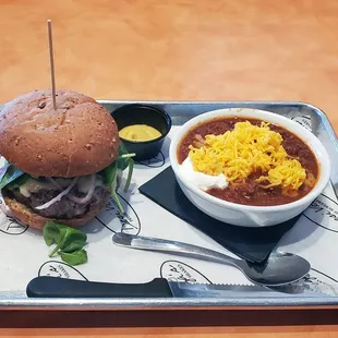Cheeseburger with side of chili.