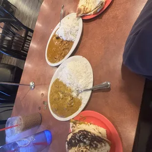 chicken masala and butter chicken with naan and iced chai