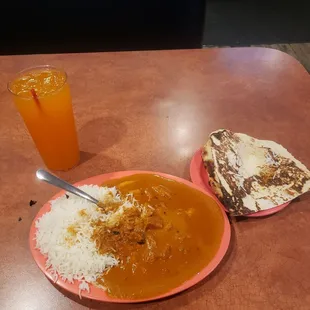 Chicken tikka masala (skimpy on the chicken) with garlic Naan bread.