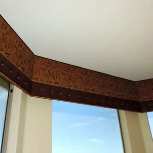 Custom Cornice, fabric and faux leather.