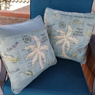 Reupholstered outdoor chair in Sunbrella with custom Tommy Bahama pillows