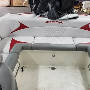 New boat interior with embroidery and   custom pleats.