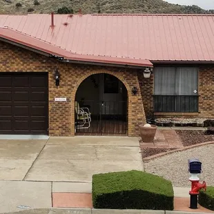 New Rustic Red 26 Gauge Metal Roof by DesignCo Construction. Let us know how we can help you.