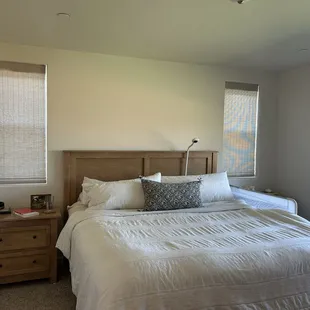 Cal king Storage bed and largest nightstand available