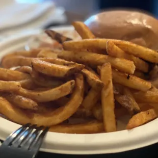 Vegan bbq sandwich with fries and coleslaw