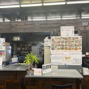 a counter with a menu on it