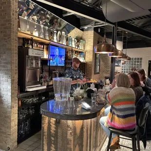 people sitting at the bar