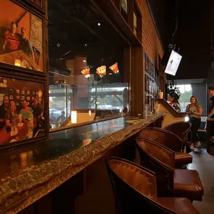 people sitting at the bar