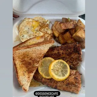 Fresh lemon pepper salmon shyfries home potatoes fried egg and toast