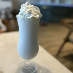 Coconut shake-- put coconut shavings on top of the whip cream