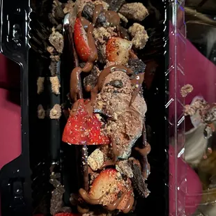 Build your own taco. Peanut butter cup ice cream, chocolate shell, strawberries, PB, Nutella.