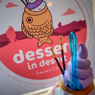 Fish filled with Nutella and taro soft serve topped with pocky.