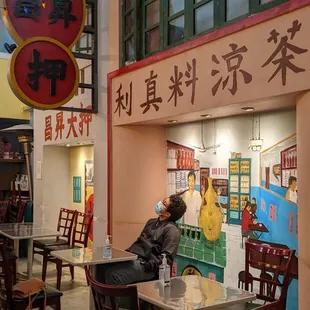 Indoor dinning area with HongKongnese architectural designs.