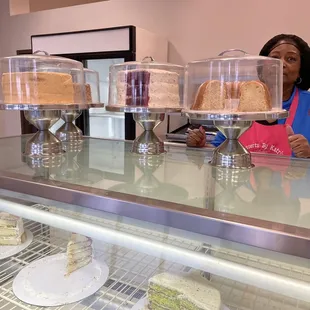 a woman behind a counter