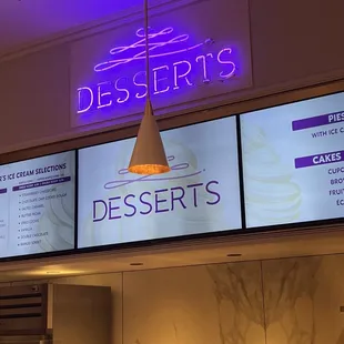 a neon sign above the counter