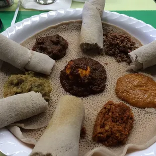 3-Meat combination platter with two vegetable selections (lentils and peas)