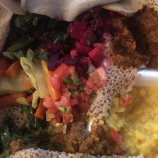 Delicious - this is not a great photo - there really is a lot of food hiding under that injera!